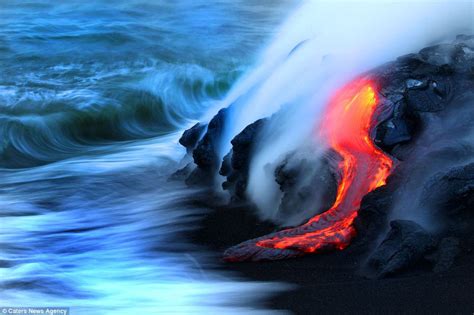 Hot Lava Crashes into the Ocean in Hawaii - Places To See In Your Lifetime