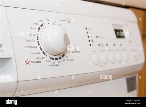 A washing machine control panel Stock Photo - Alamy