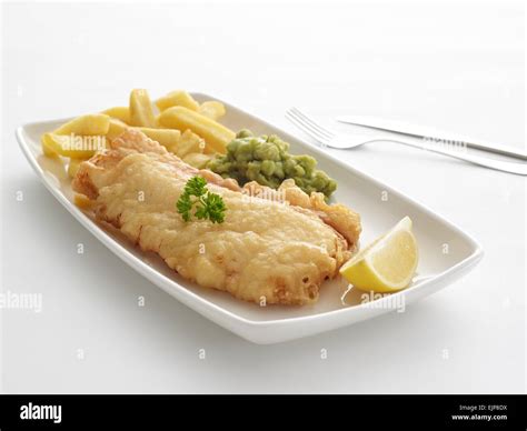 battered fish and chips Stock Photo - Alamy