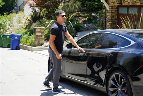 PHOTO Leonardo DiCaprio Getting In His Tesla Model S Monday