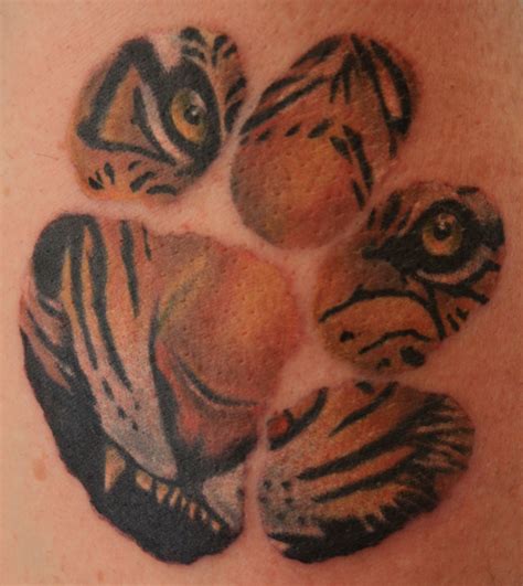 Tiger Paw Print Tattoo Tattoo - TattoosKid