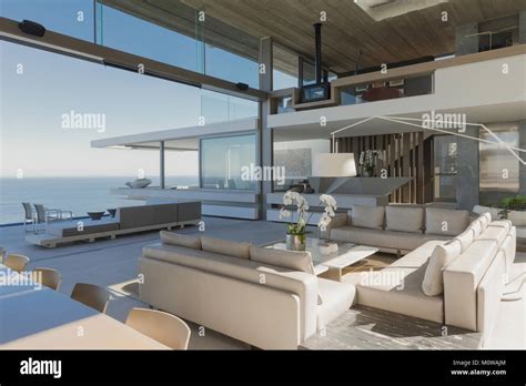 Modern, luxury home showcase interior living room with ocean view Stock ...