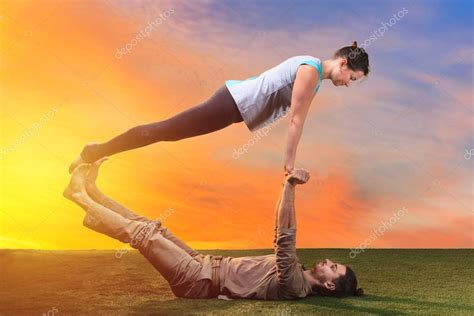 The two people doing yoga exercises — Stock Photo © vova130555@gmail ...