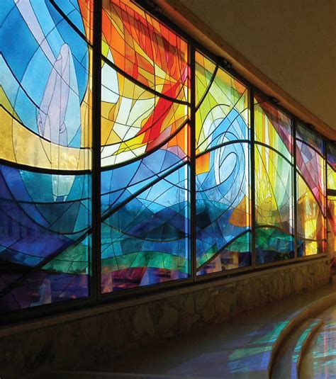 a large stained glass window in a building