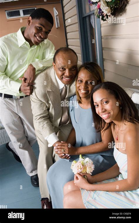 Portrait of a smiling family Stock Photo - Alamy