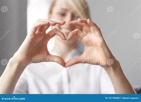 Blurred Lady Showing Hand Heart Gesture Stock Photo - Image of shape ...