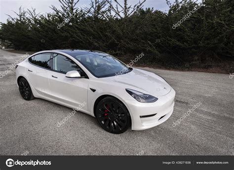 Pearl white electric Tesla Model 3 performance car near San Francisco ...