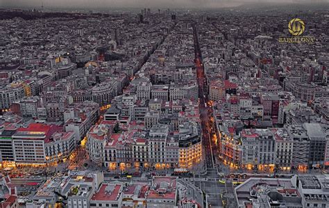 an aerial view of a city at night with the eiffel tower in the distance