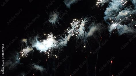 Fireworks exploding in the dark night sky Stock Video | Adobe Stock