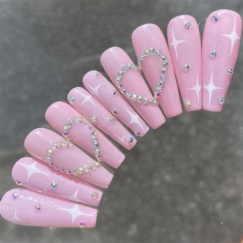 Pink heart sparkly nails •Shape in the picture is... - Depop