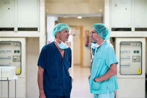 Two surgeons talking in hospital by ADDICTIVE CREATIVES - Hospital ...