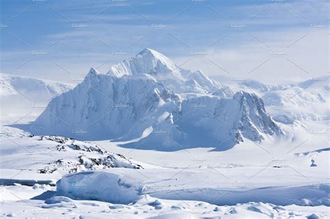 Mountain peak in Antarctica | Nature Stock Photos ~ Creative Market