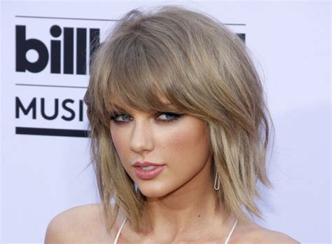 Taylor Swift's dirty blonde hair in a slightly disheveled bob