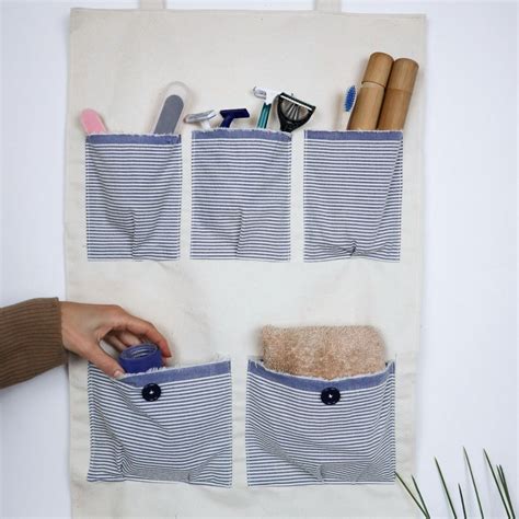 DIY Hanging Organizer with Pockets - Craftsy Hacks