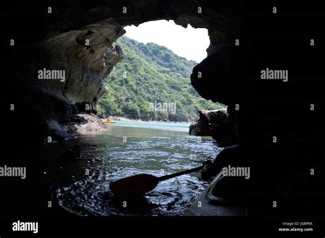 Kayaking in Ha long bay Stock Photo - Alamy