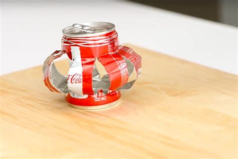 Upcycle Your Soda Cans Into These Charming Hanging Lanterns | eHow