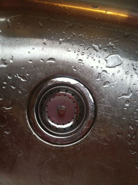 Clean your stainless steel sink. 1/2 lemon, dip in baking soda. Scrub ...