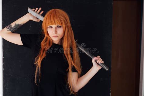 Portrait of a Beautiful Girl with a Japanese Sword Cosplayer Anime ...