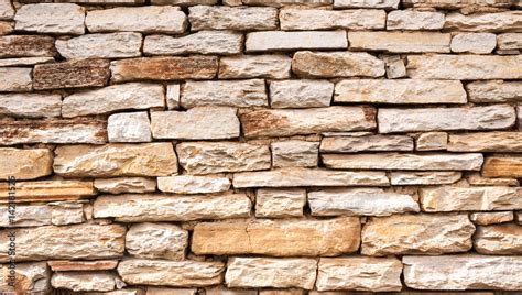 Old stone wall background Stock Photo | Adobe Stock