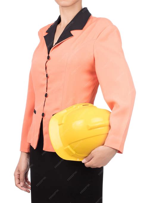 Premium Photo | Woman civil engineer in orange shirt holding safety ...