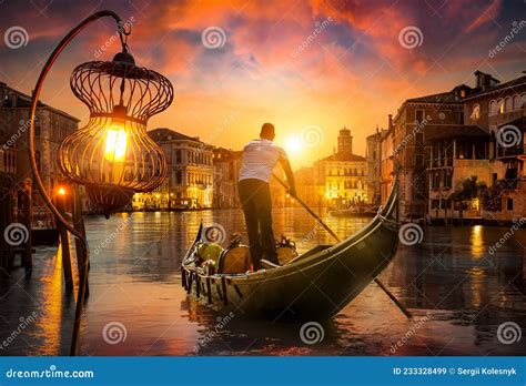 Gondolier at sunset editorial stock image. Image of blue - 233328499