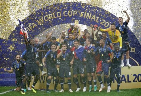 Tens of thousands flood Paris streets to celebrate France's World Cup ...