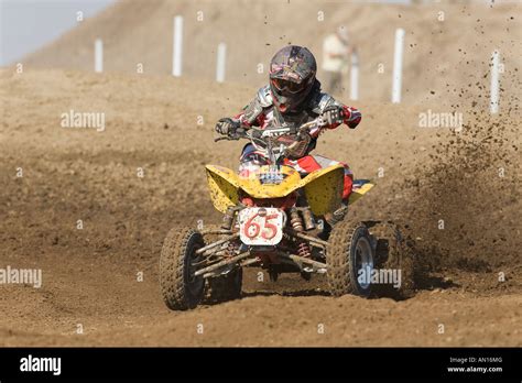 Four wheel Quad bike racing Stock Photo - Alamy