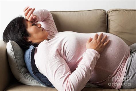 Tired Pregnant Woman Photograph by Cristina Pedrazzini/science Photo ...