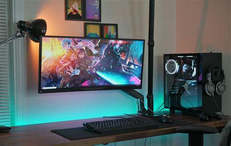 A single, ultrawide monitor setup built into a NZXT S340. That lamp ...