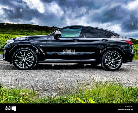 Black BMW X4 M40i parked in the Yorkshire Dales Stock Photo - Alamy