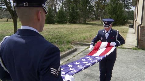 Folding A Flag At Funeral