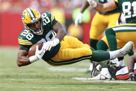 AJ Dillon injury update: Packers RB expected to play Sunday vs ...