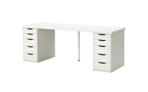 a white desk with four drawers on it