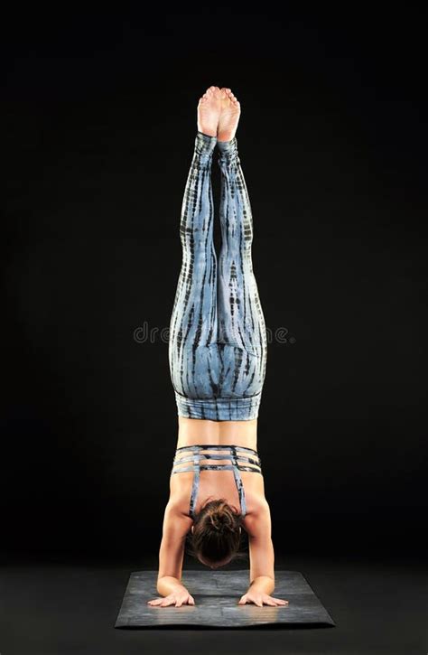 Woman Demonstrating a Forearm Stand or Pincha Pose Stock Image - Image ...