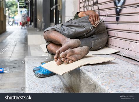 Homeless Person Sleeping On Roadside City Stock Photo 1883795695 ...