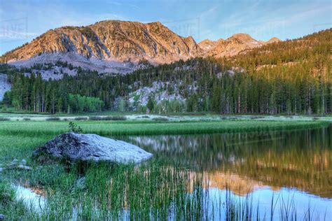 USA, California, Sierra Nevada Mountains. Calm reflections in Grass ...