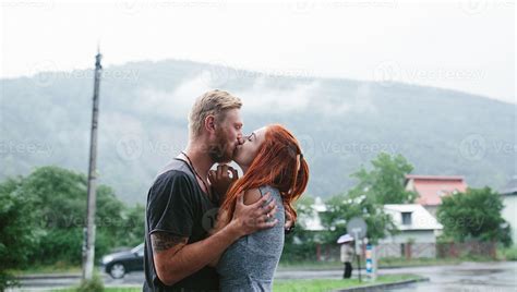 beautiful couple hugging in the rain 11488384 Stock Photo at Vecteezy