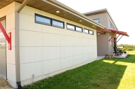 Fiber cement panel siding on garage. | Garage exterior, Modern style ...