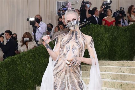 Grimes Want to be 'Totally Covered' in Alien Tattoos