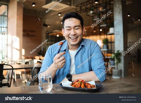 Happy Asian Man Eating Bbq Chicken Stock Photo 2091026011 | Shutterstock