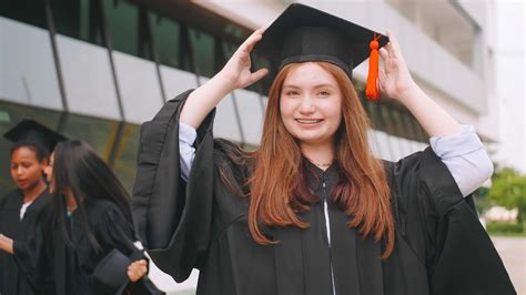 A girl celebrating her graduation day. 11098111 Stock Photo at Vecteezy