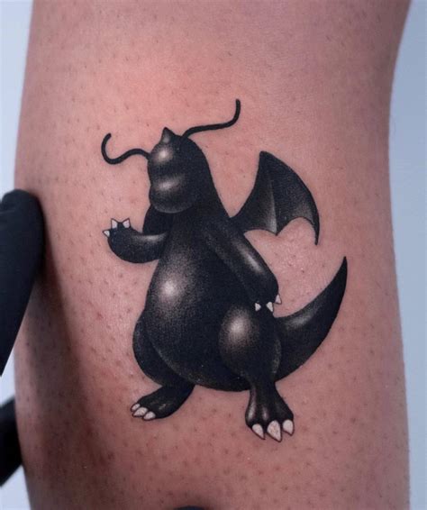 Dragonite tattoo located on the calf.