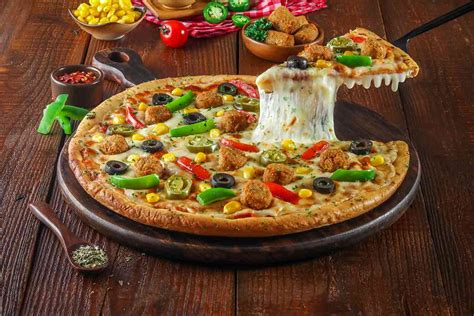 Order Veg Falafel Supreme Pizza Cheese Burst Pizza Medium from ...