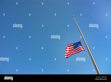 American flag at half-staff Stock Photo - Alamy