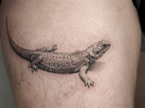 Bearded Dragon tattoo done on the thigh,