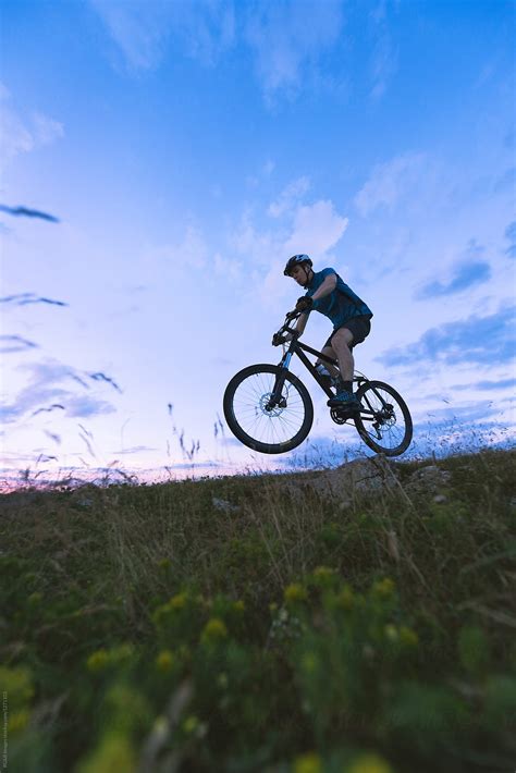 "Man Doing One Wheel Trick On Mtb Outdoor In Nature" by Stocksy ...