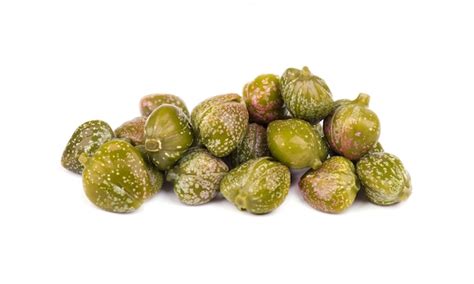 Premium Photo | Capers isolated . pickled capers. canned capers