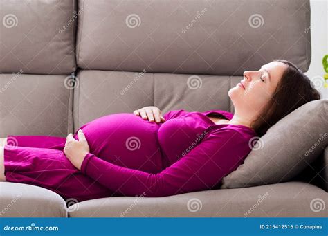 Tired pregnant woman stock photo. Image of female, closed - 215412516