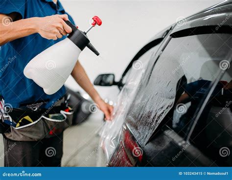 Male Hand with Spray, Car Window Tint Installation Stock Image - Image ...