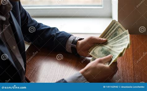 Businessman Hand Grabbing Money, US Dollar USD Bills.man in Suit Stock ...